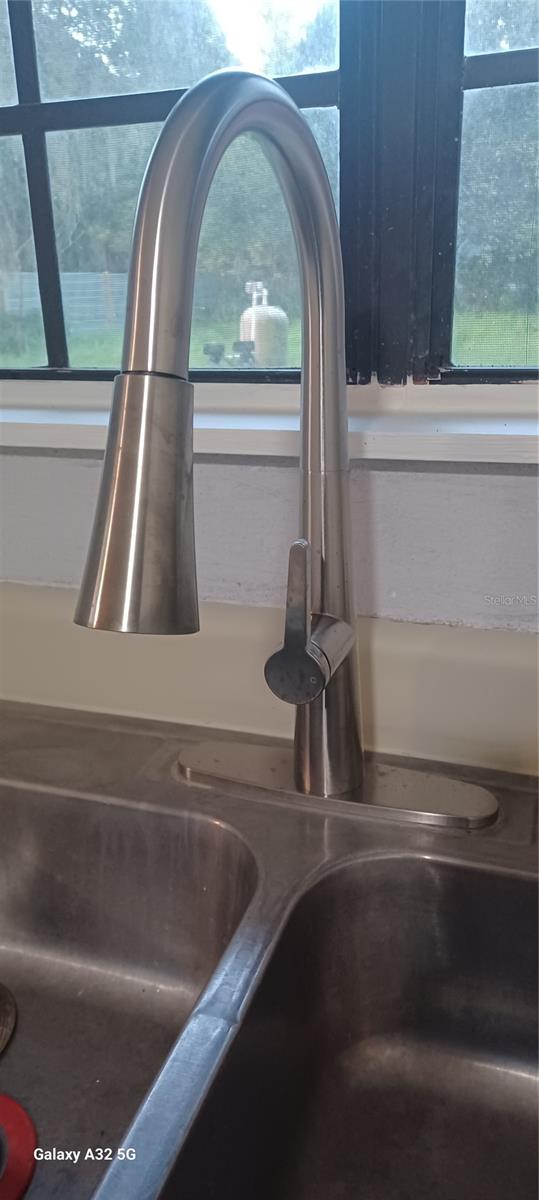 new expensive stainless steel pull-off faucet with light...
