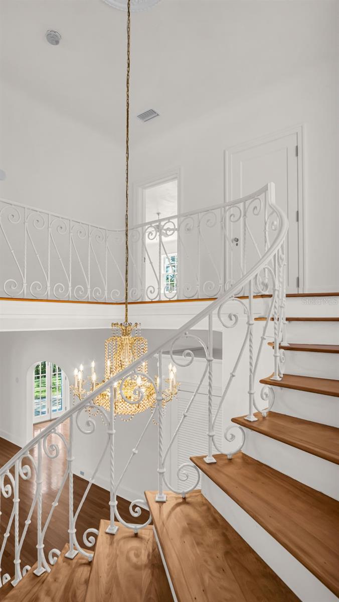 Original Wrought iron staircase rail and Chandeliers