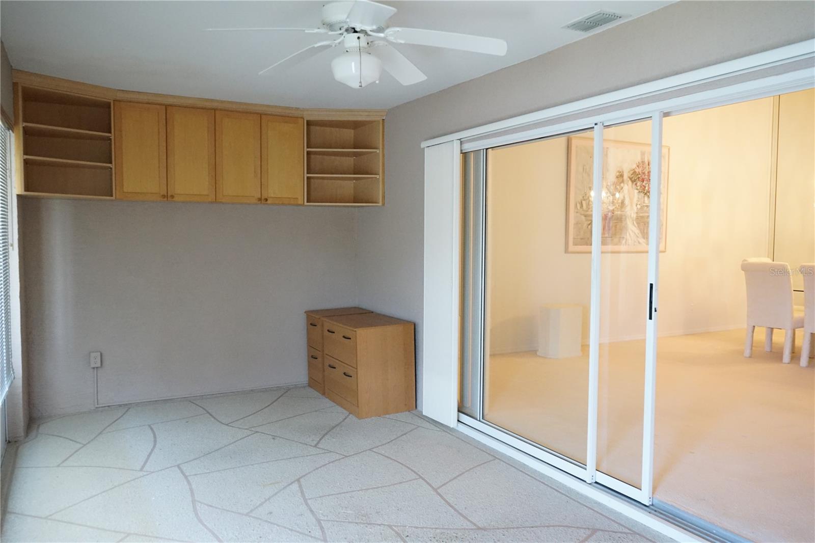 lanai is under air with cabinets for office or hobby use