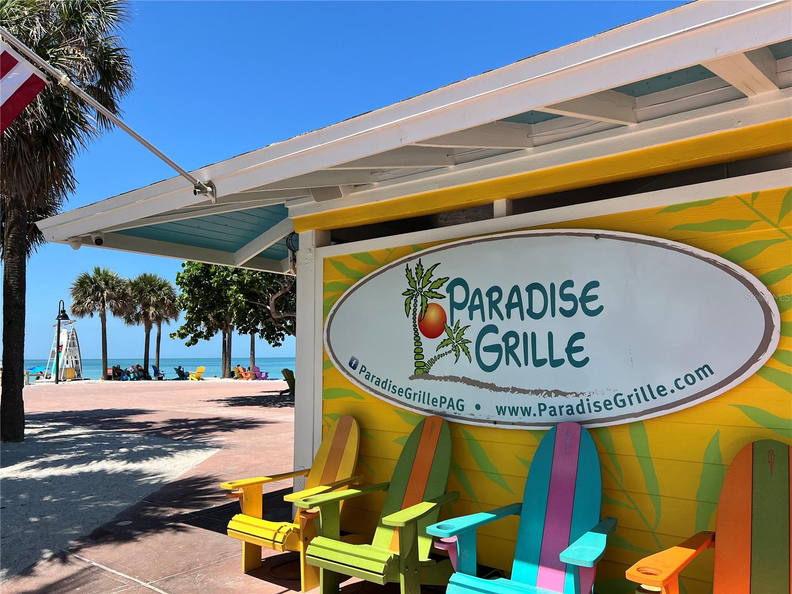 Paradise Grilled directly located on Pass A Grille Beach