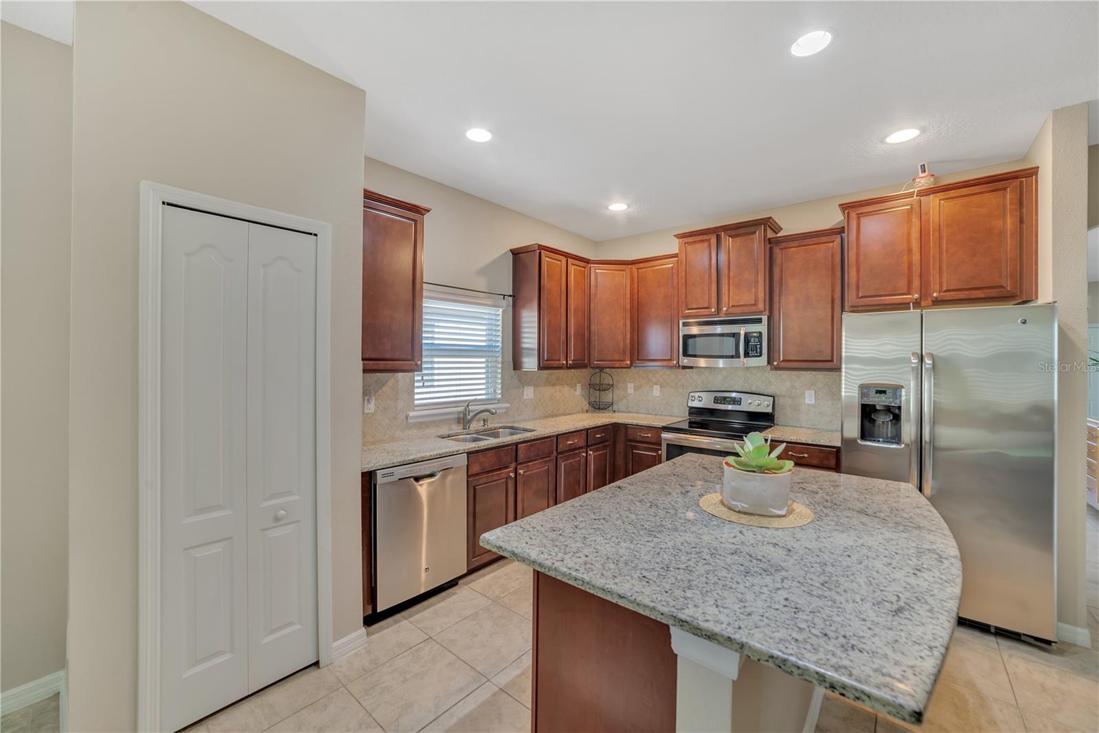 CONVENIENT CLOSET PANTRY IN KITCHEN