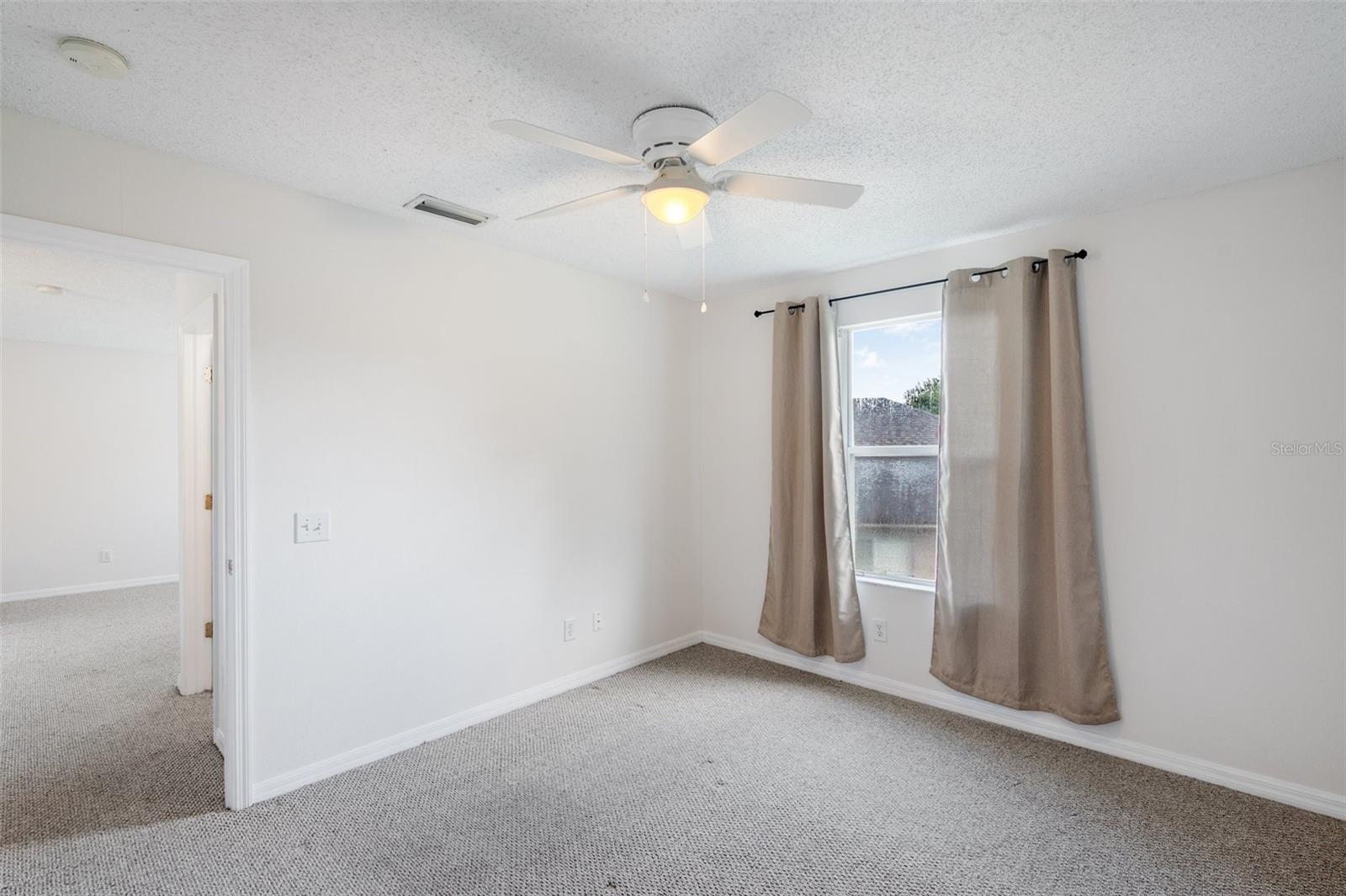 4th Bedroom - Upstairs 12'6"x11'1" with ceiling fan