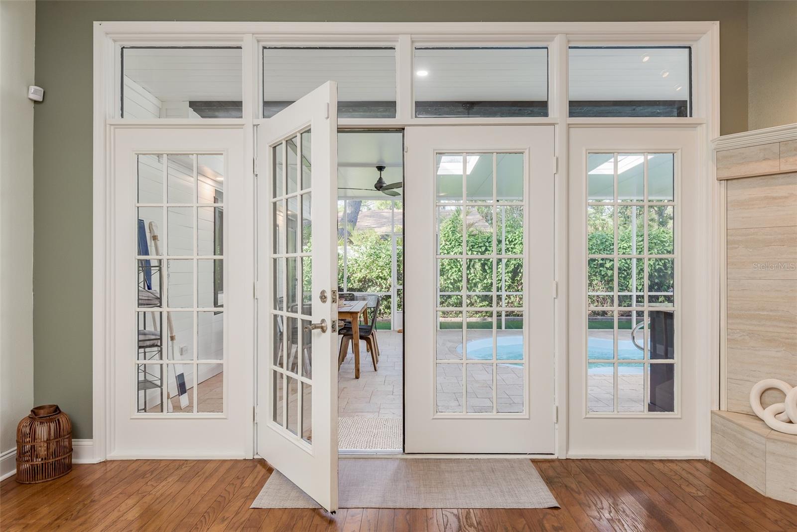 French doors out to private yard and pool