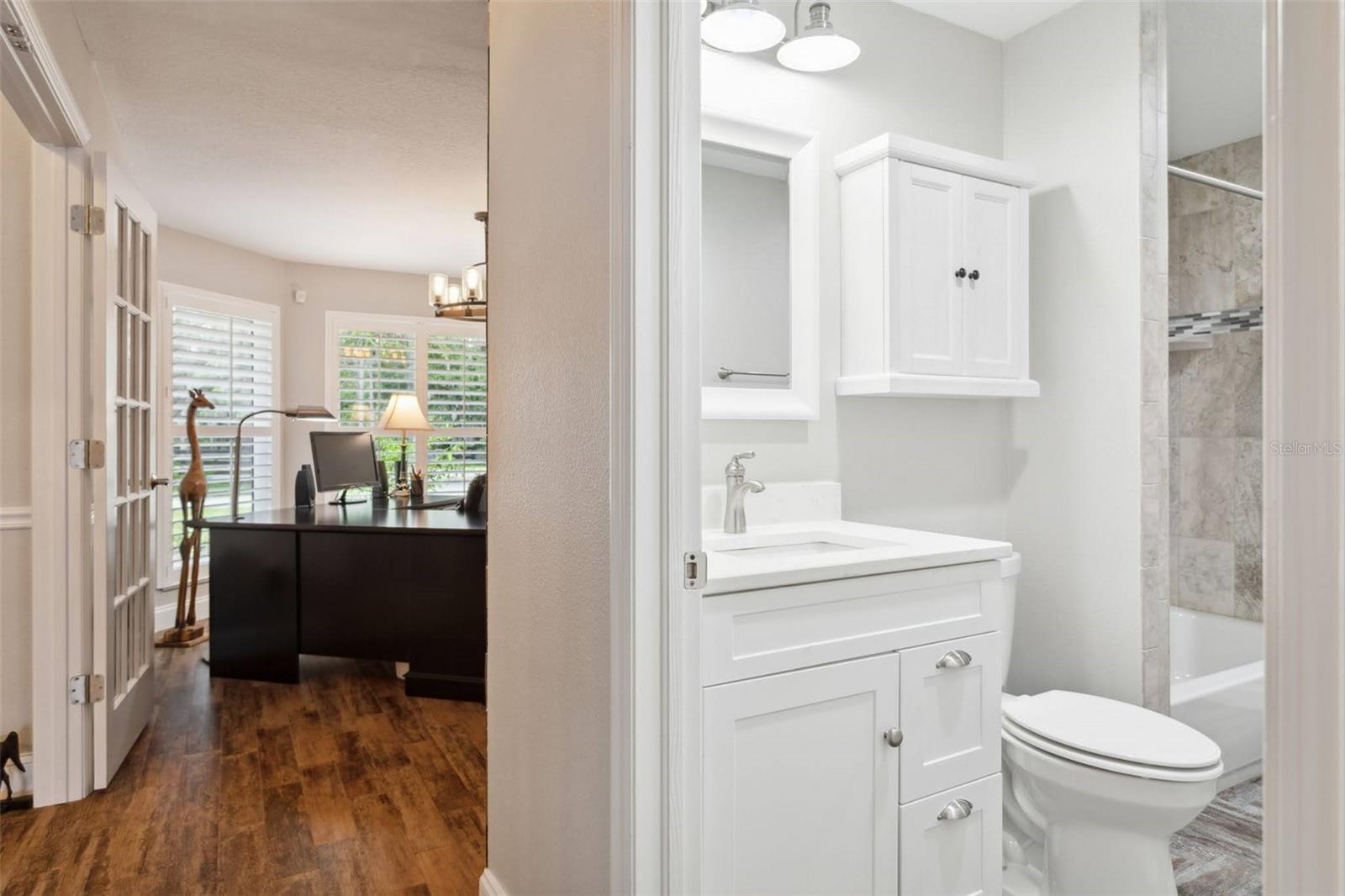 Full bath room is situationed adjacent to the family room.