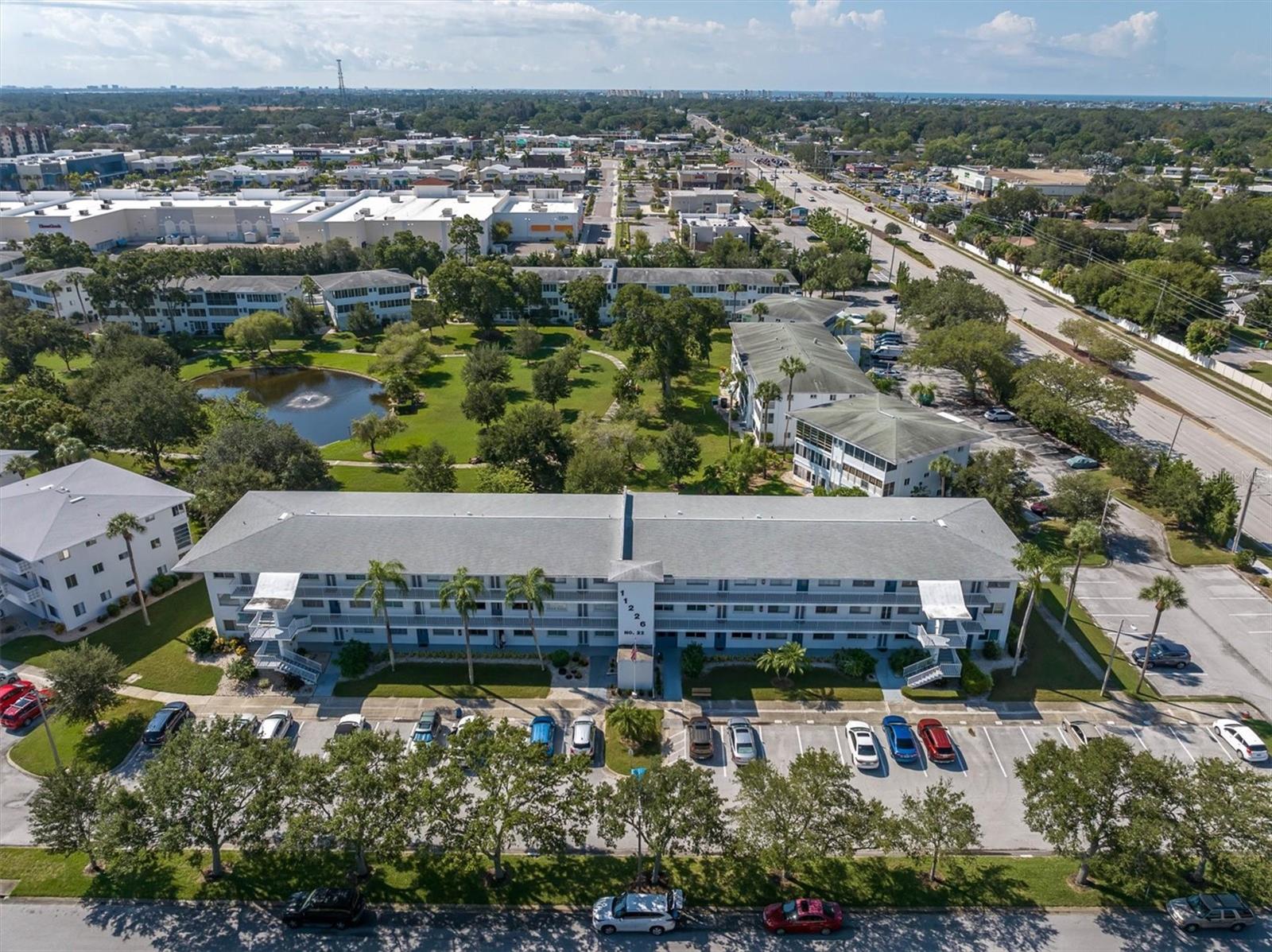 Front of building 22. Seminole City Center in background (giant white roofs back left in the frame). And, see that giant road to the right of the building? That's 113th St and it goes straight down to the beaches, Madeira Beach specifically, which is only 4 miles away.