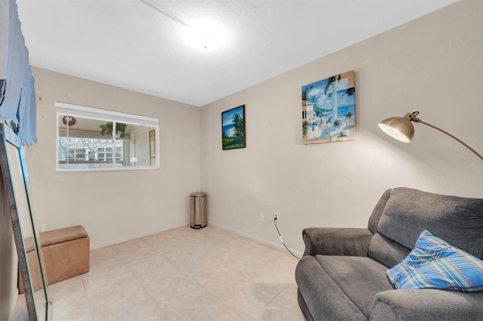 This is the bonus room. The original DELUXE floor plan with the one giant bedroom was modified by a previous owner to create this awesome extra bonus space. Go crazy with it! Craft room, bunkbeds for the grandkids, secondary TV room, office...