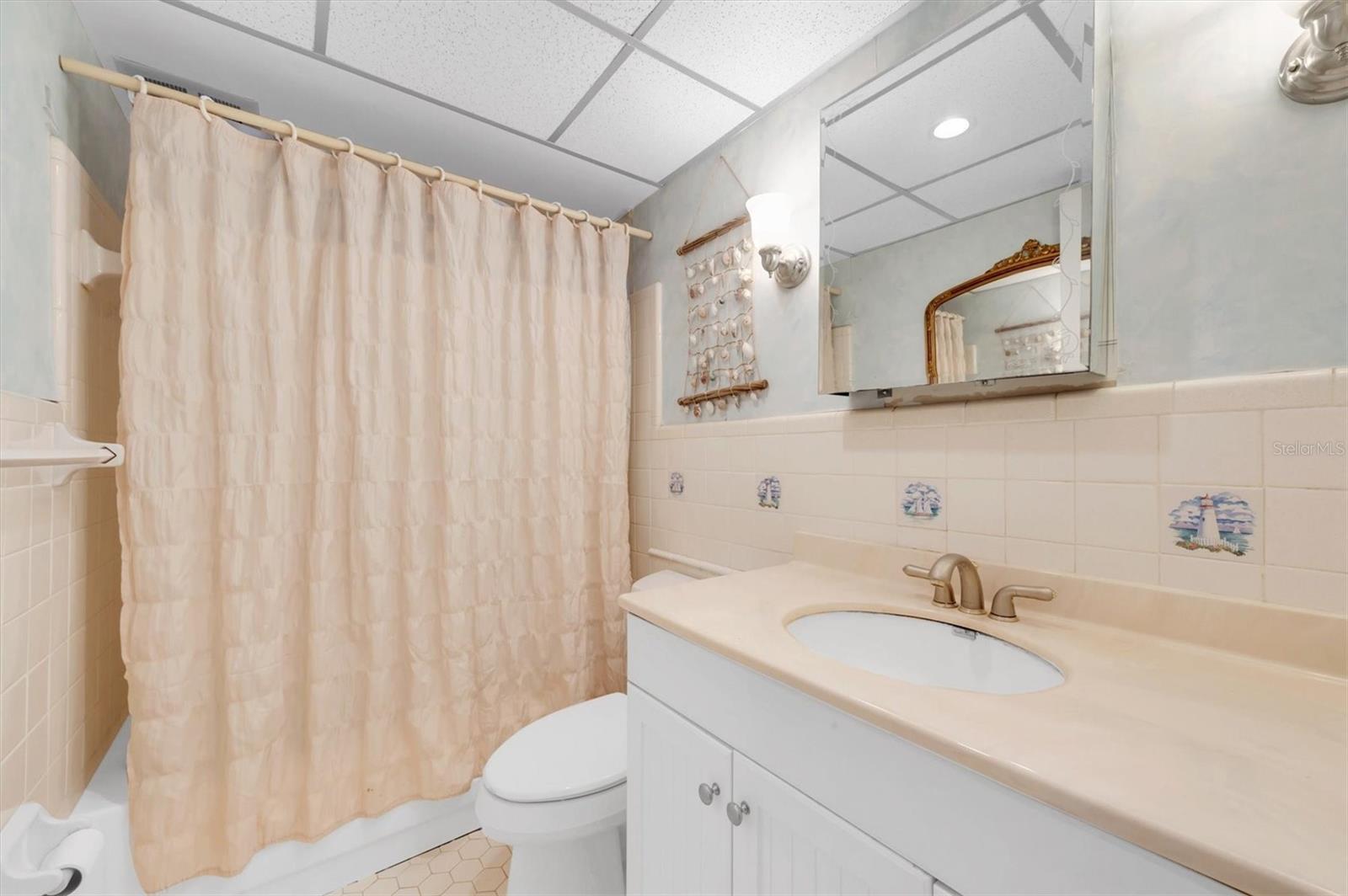 Bathroom is clean and bright with good storage, medicine cabinet and more room in the newer vanity.