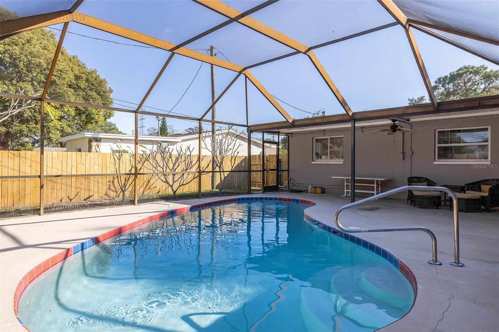 Private screened in pool with covered lanai