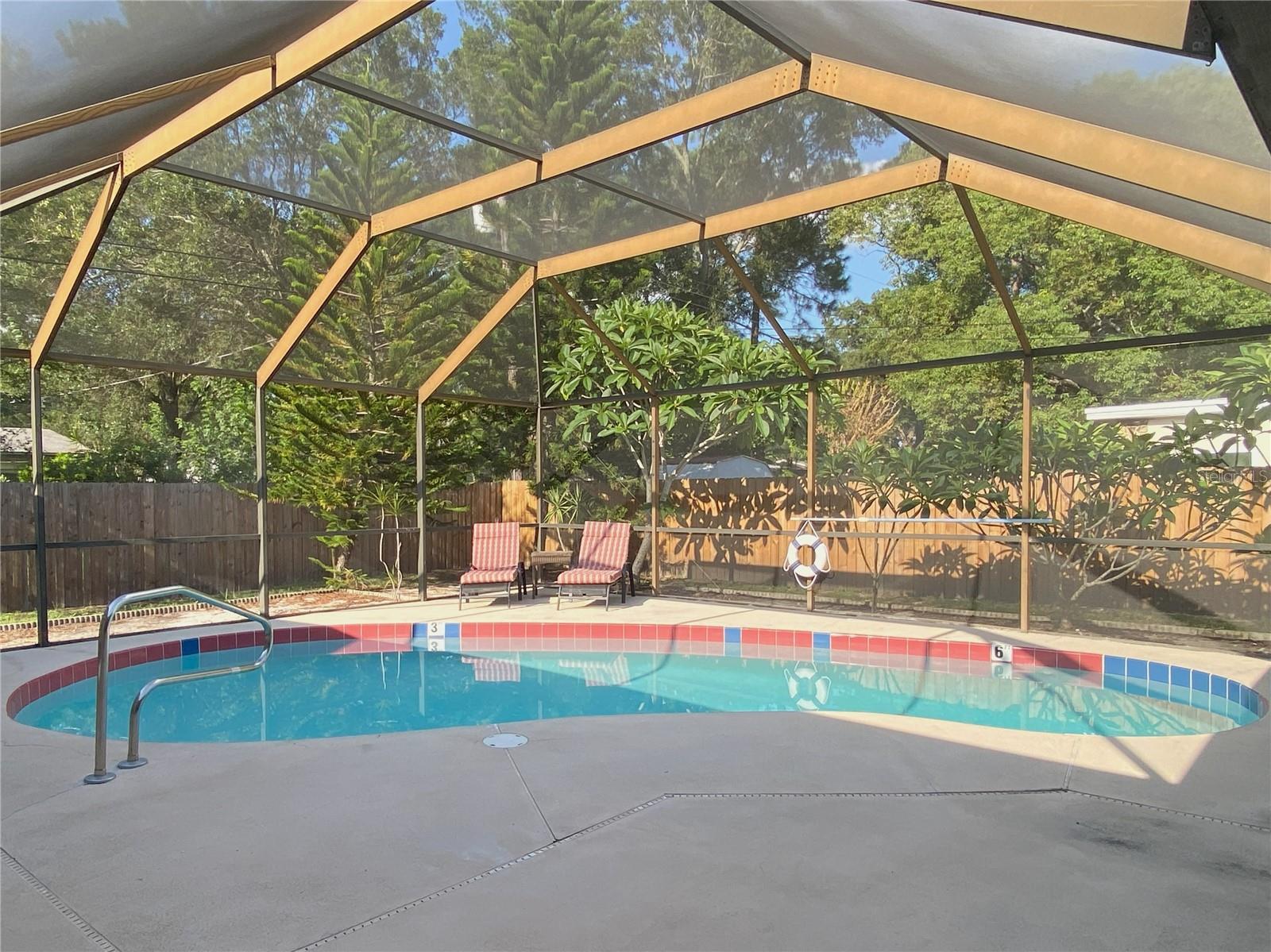 Private screened in pool with covered lanai