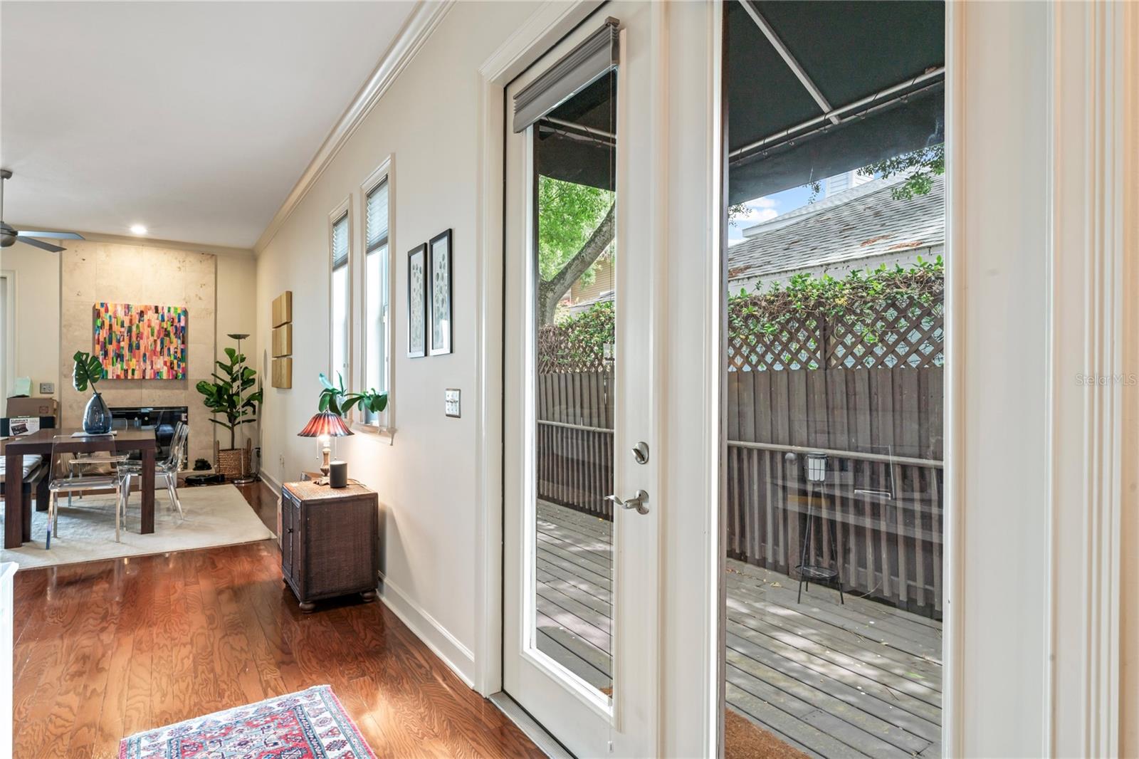 French doors to spacious side deck.