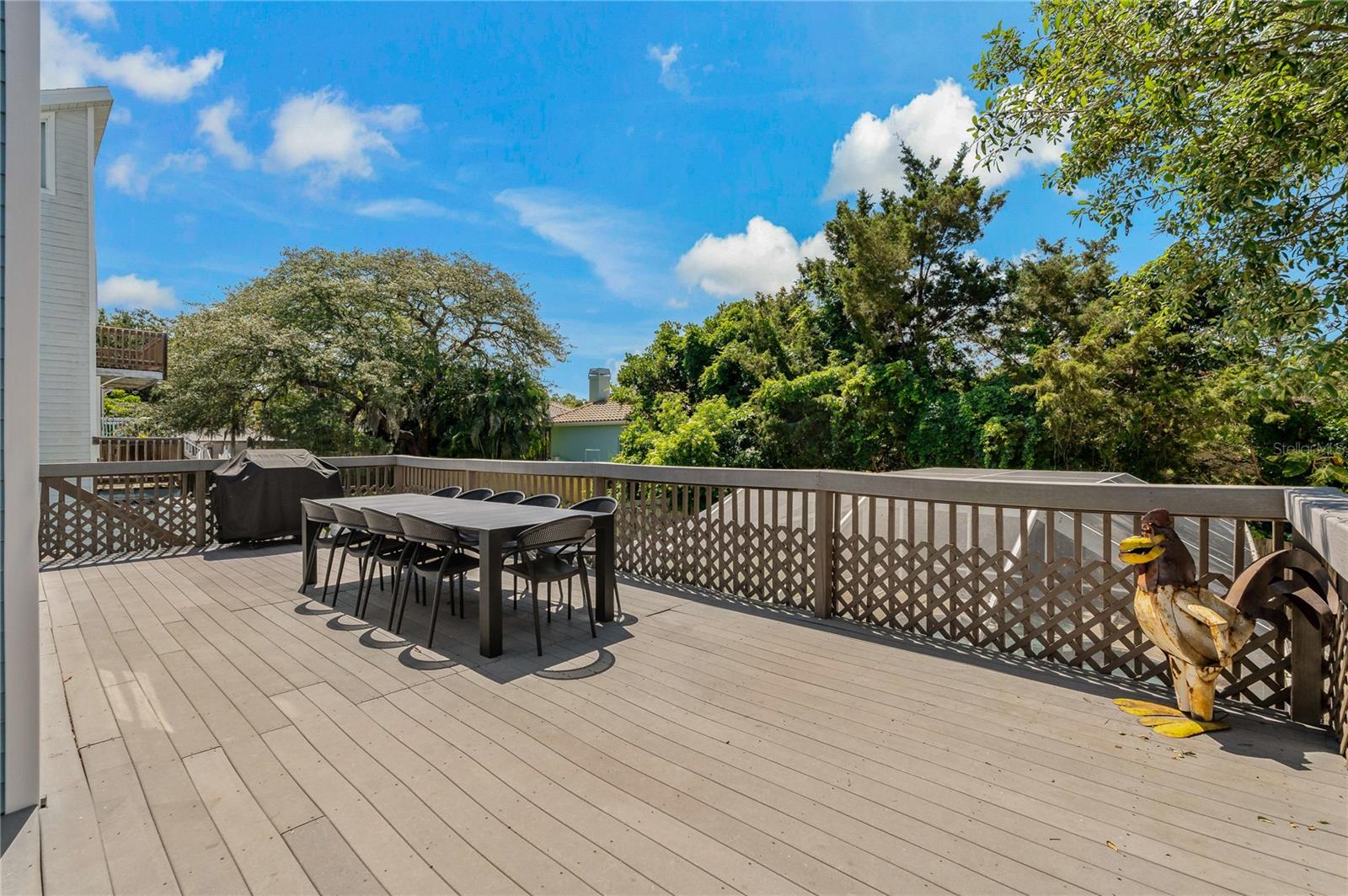 EXPANSIVE REAR BALCONY OVERLOOKING THE POOL & SPA!