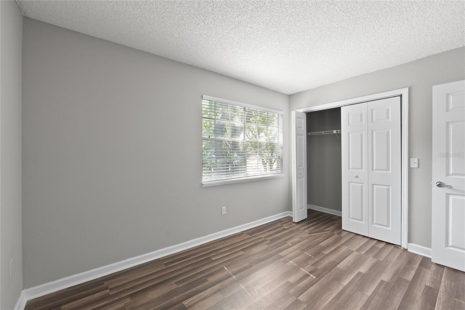 2nd bedroom with lots of natural light