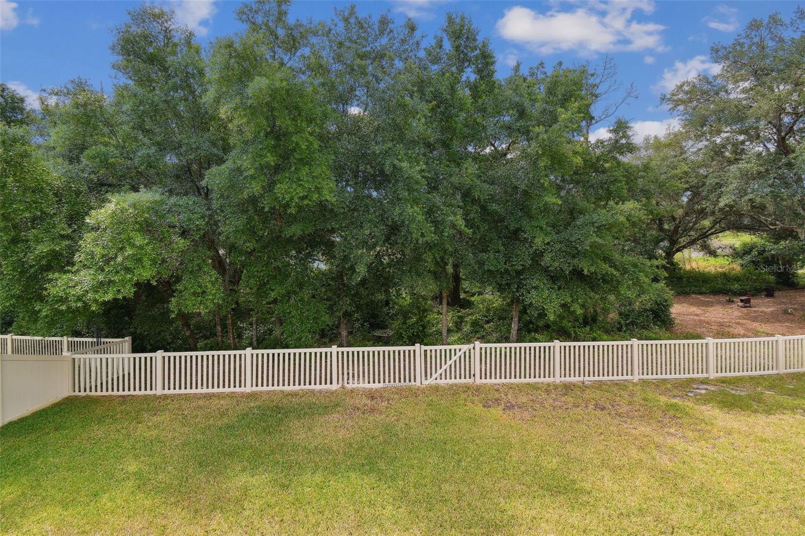 view of the private fully fenced in back yard