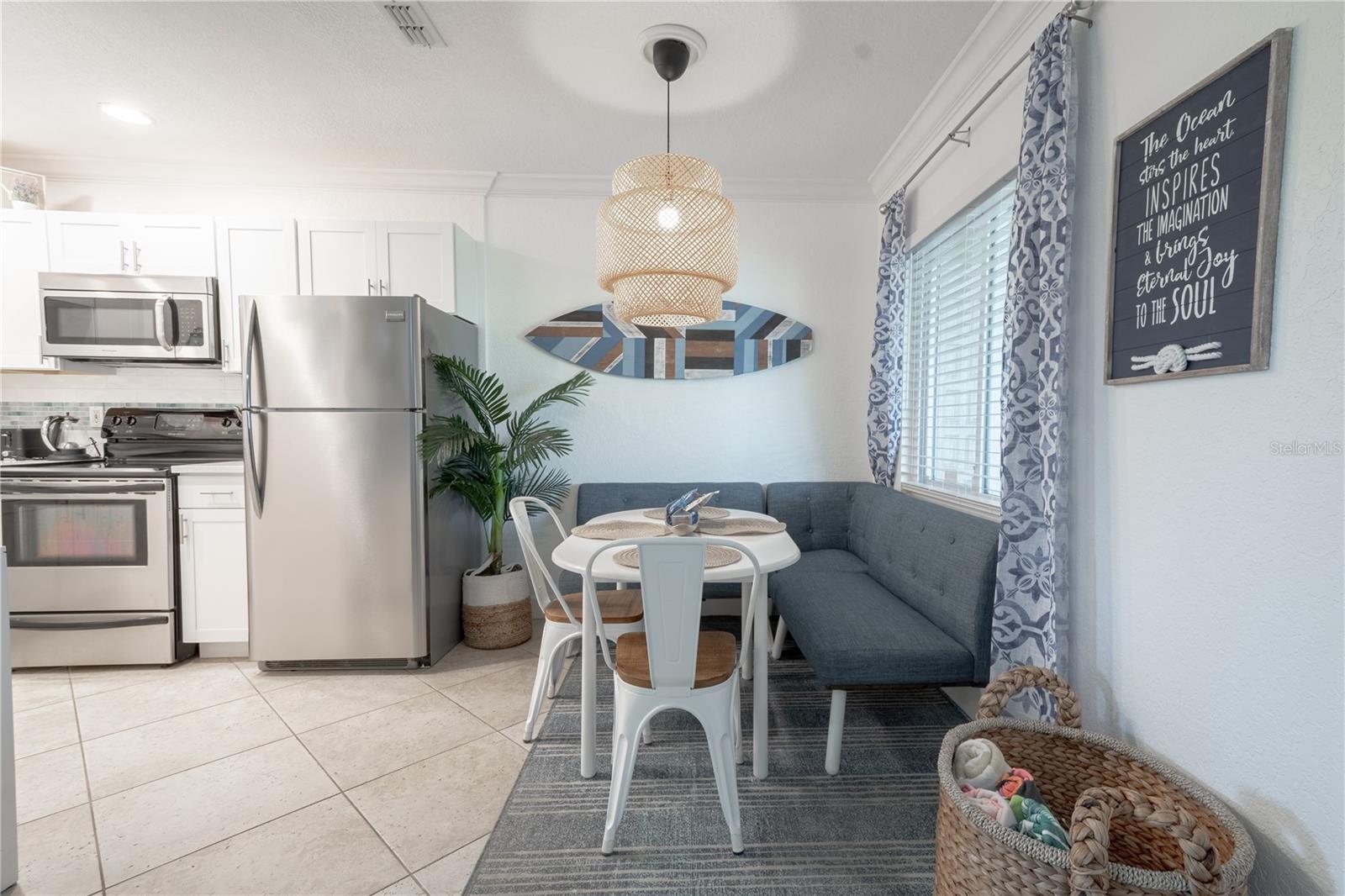 A quaint banquette provide seating for dining.