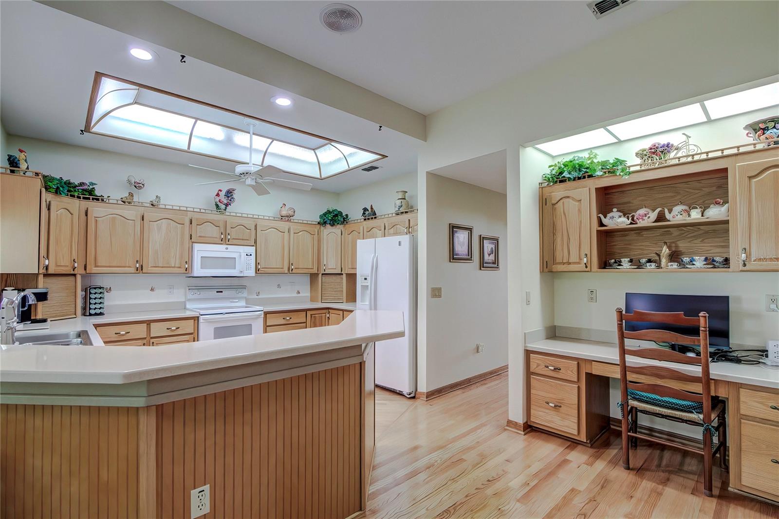 Kitchen with Breakfast Bar and Built-In Desk Area