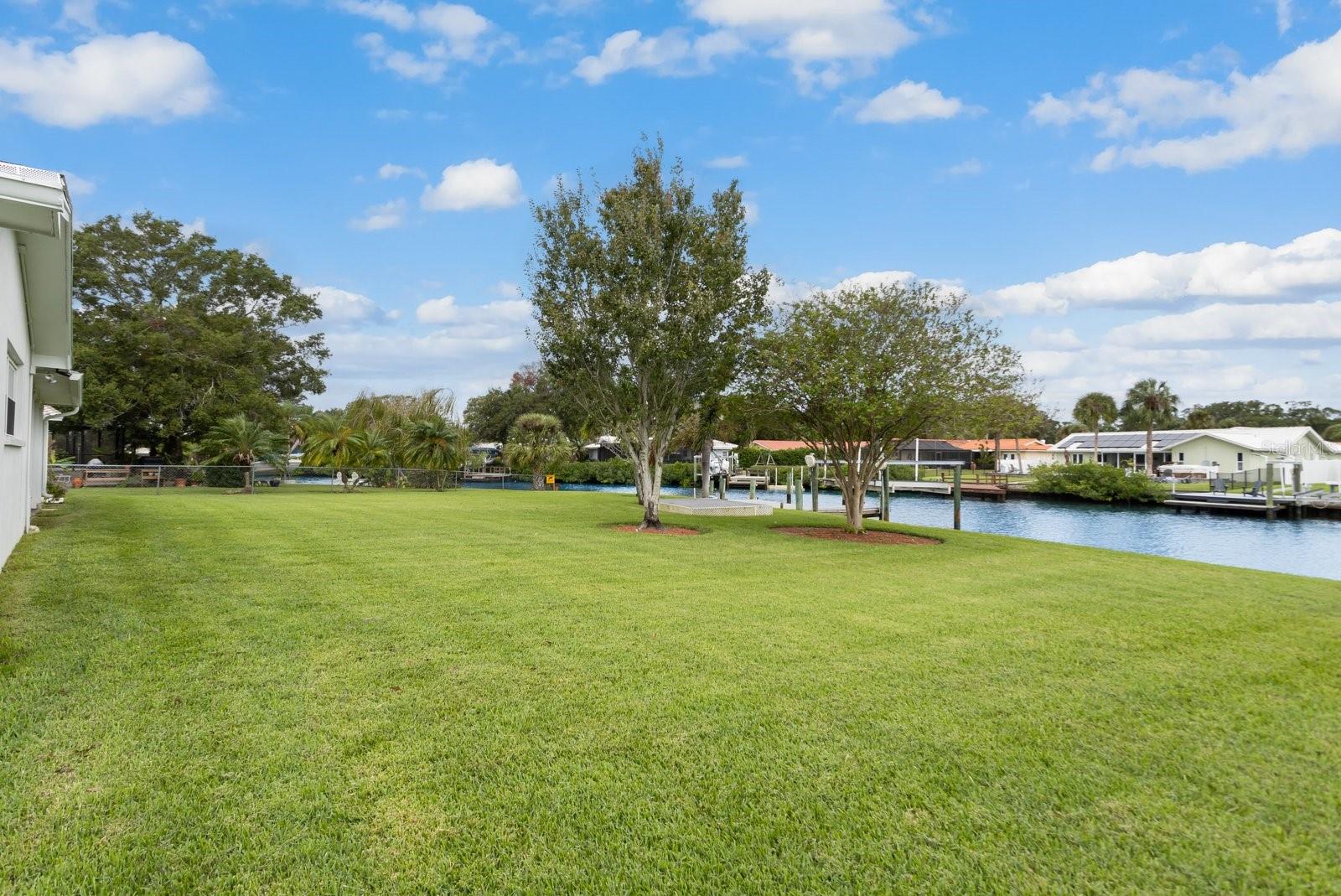 Look at that land! Perfect for entertaining, adding pool or spa or just room to roam!