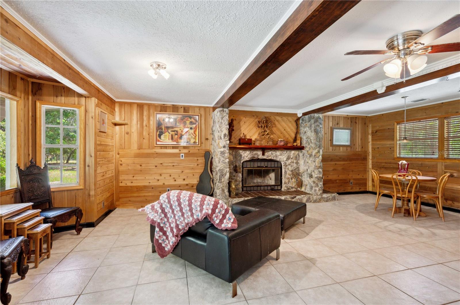 Stone Fireplace in Family room with Bay windows