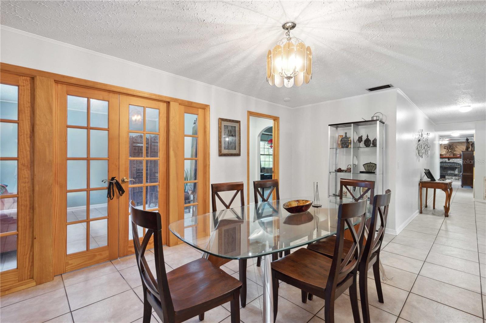 Formal dining room leading to sun room