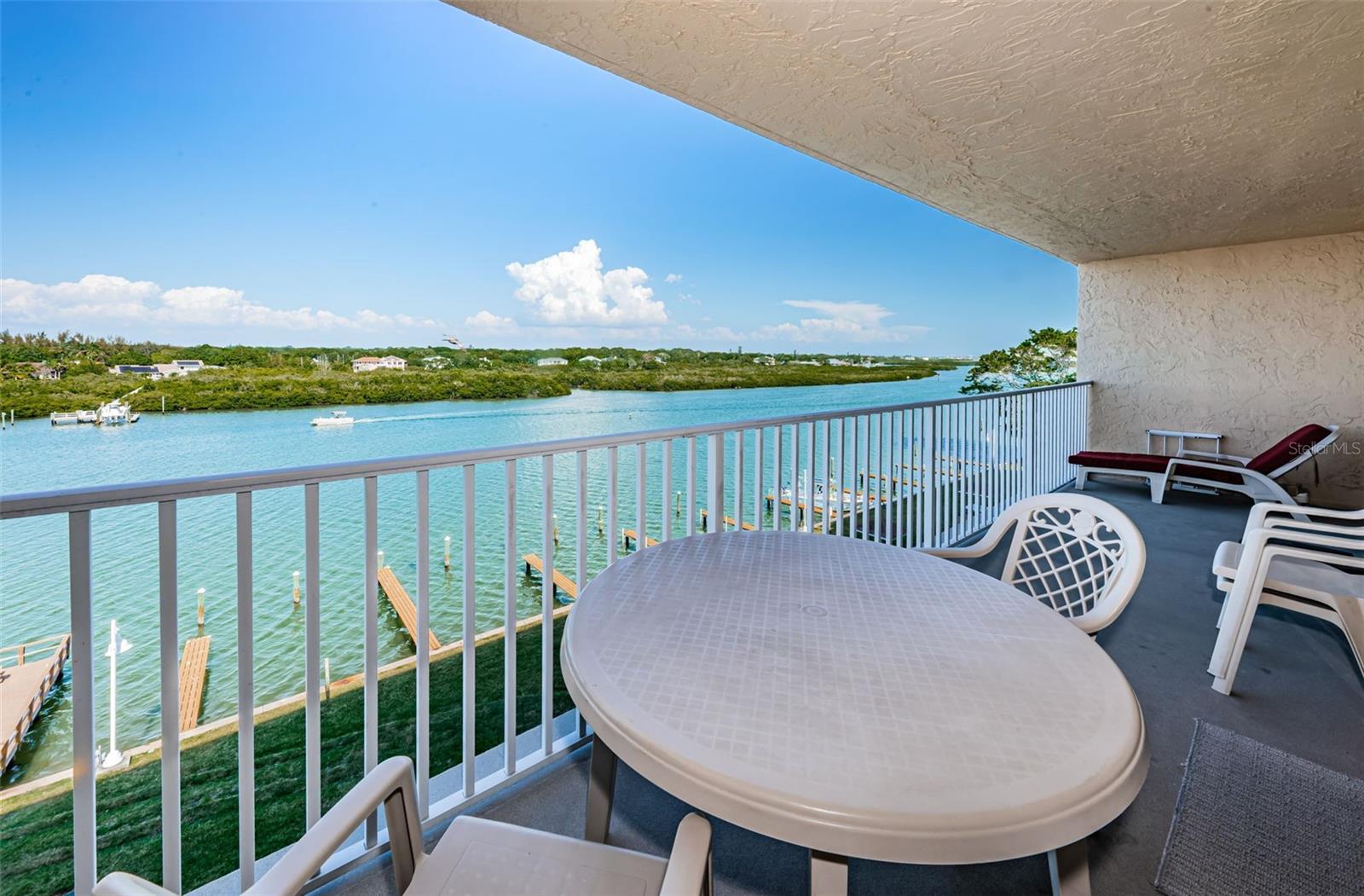 Step out of the Living Room to your lovely waterfront balcony!