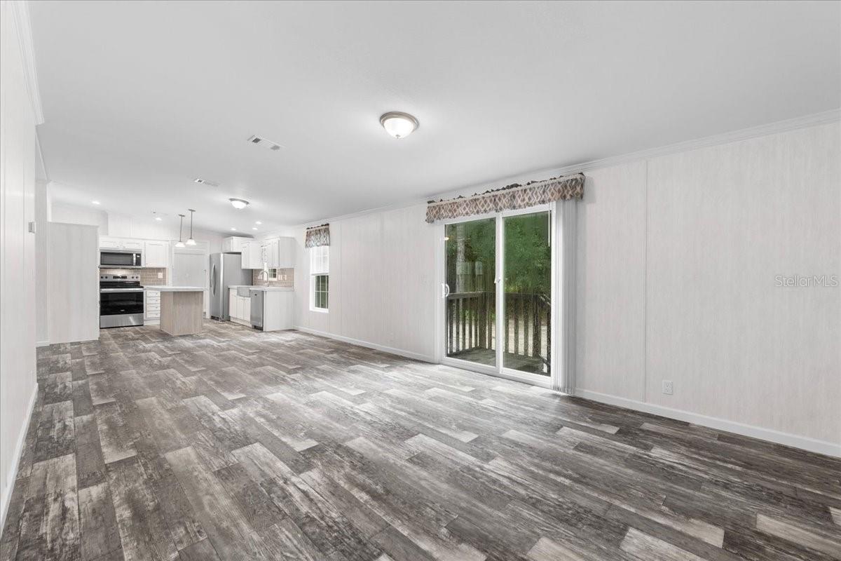 View from Family Room w/Sliding Glass Door to Backyard