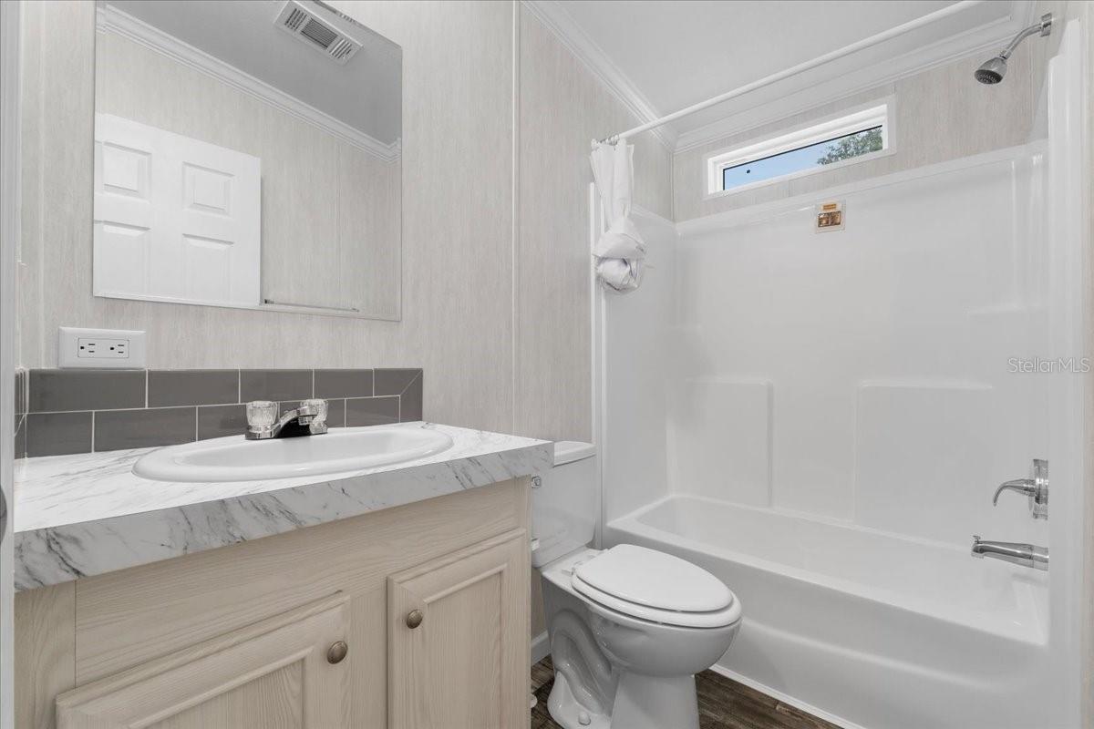 Bathroom 2 w/Tub and Transom Window