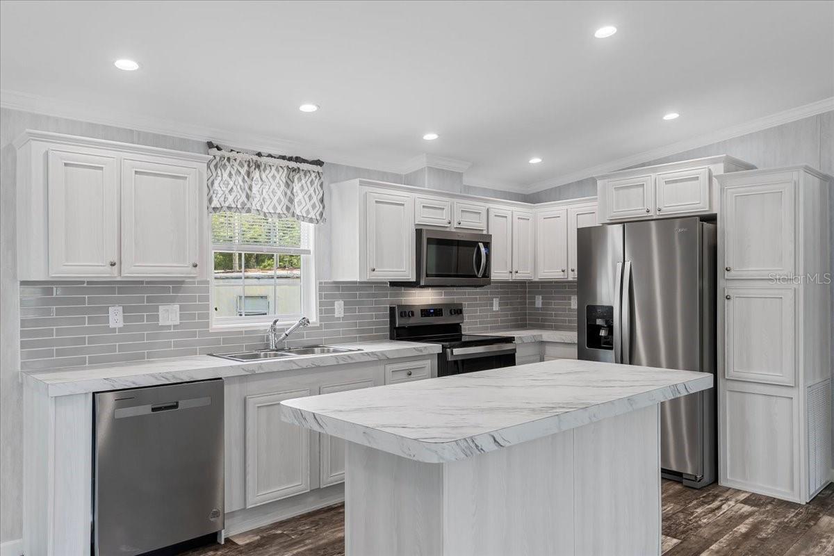 Kitchen w/Stainless Stell Appliances Pantry