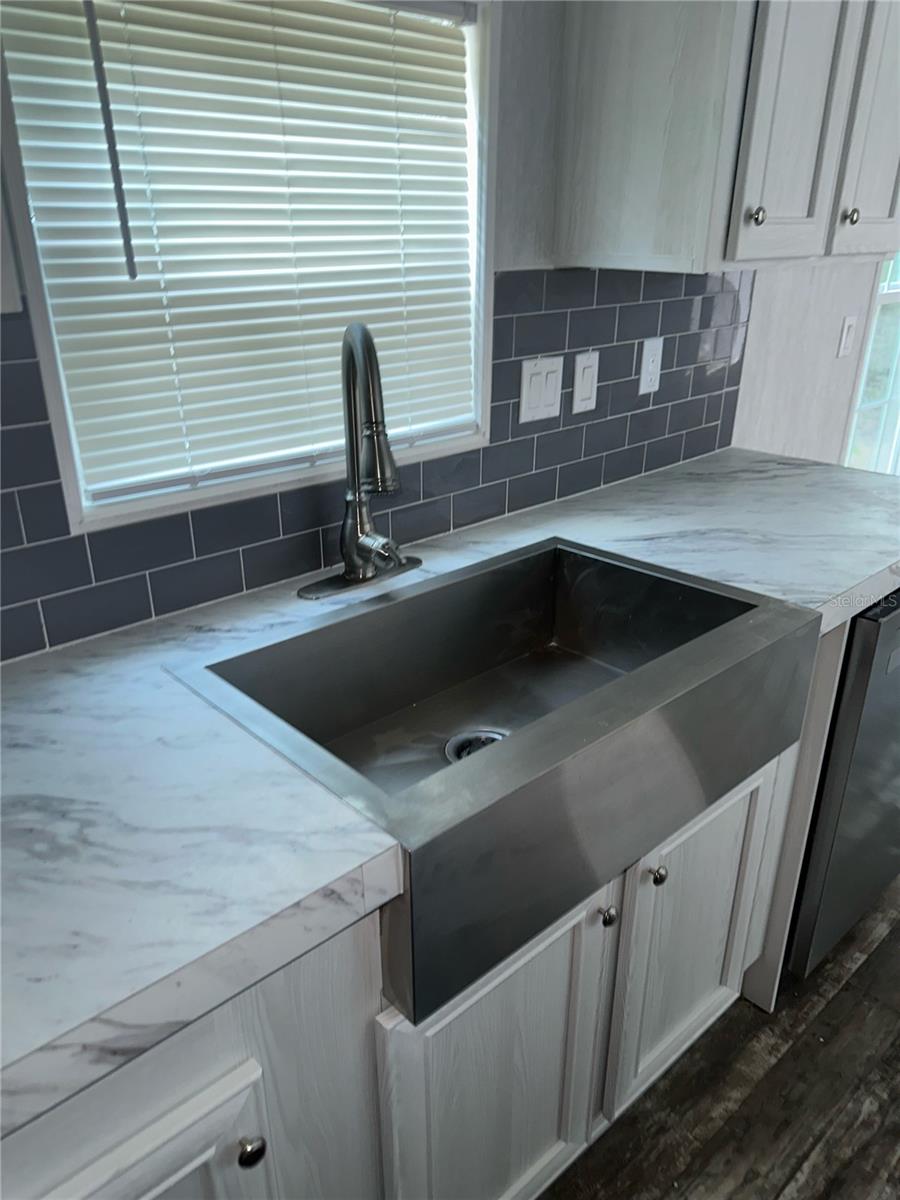 Farmhouse Sink w/view of Backyard