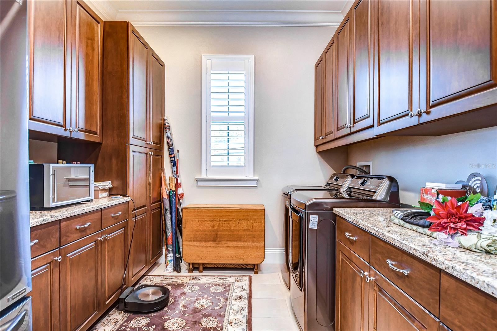 Huge laundry room with tons of storage!