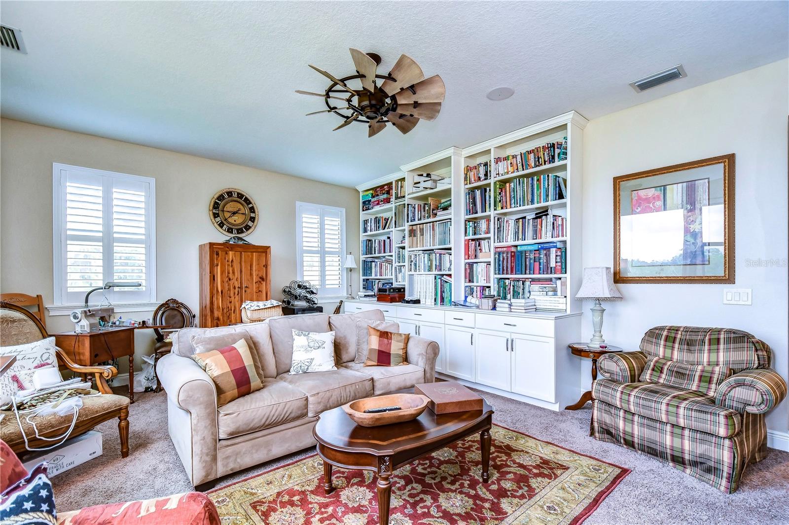 Bonus room offers built-in bookcase and storage!