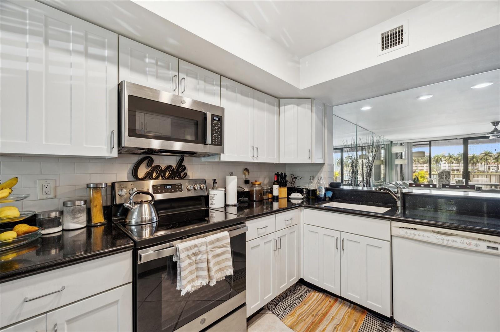 View open floorplan kitchen to the dining/living room