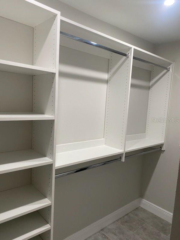 Walk In Custom Cabinetry Closet