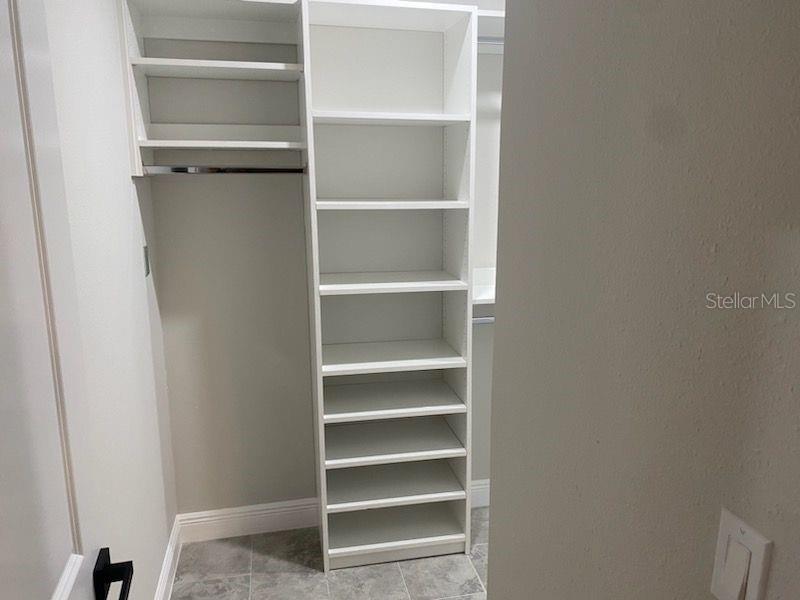 Walk In Custom Cabinetry Closet