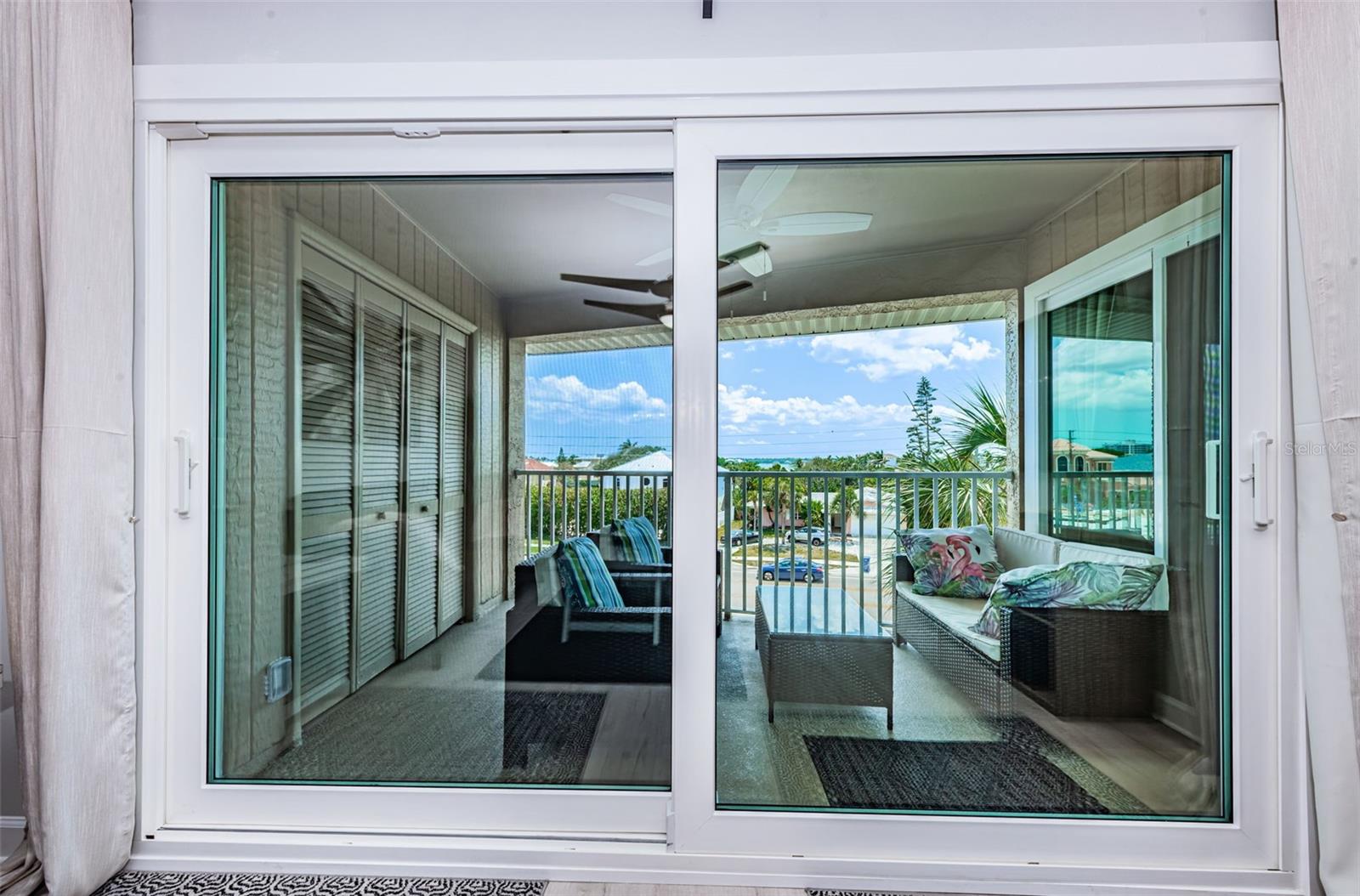 Big sliding door leading to the balcony, this room seamlessly connects indoor comfort with outdoor beauty.