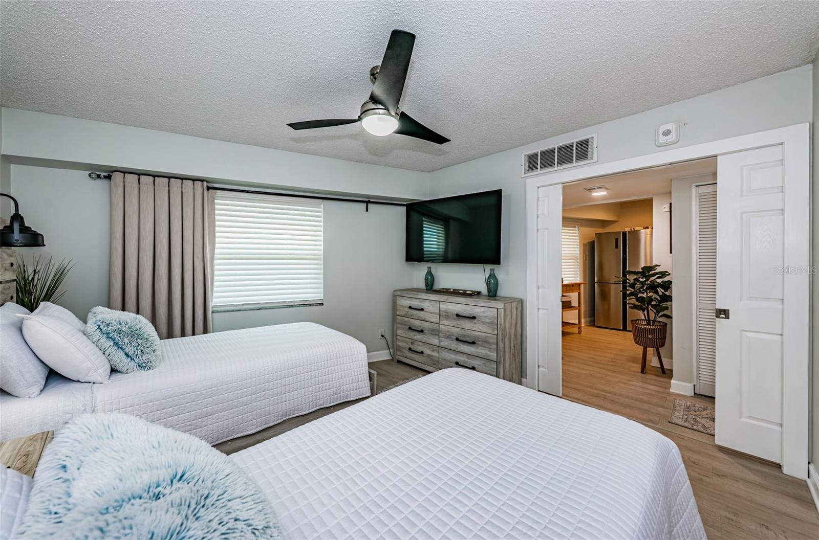 Bathroom 2 of Unit 132, where convenience meets style! With its dual sinks, everyone can get ready for the day without any hassle.