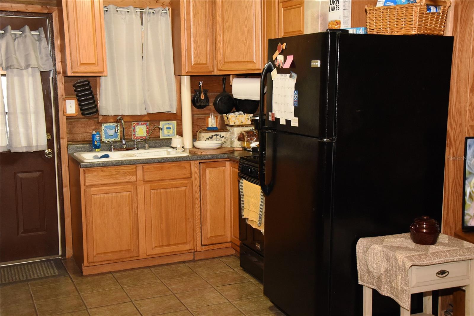 Kitchen, and back door to screened porch