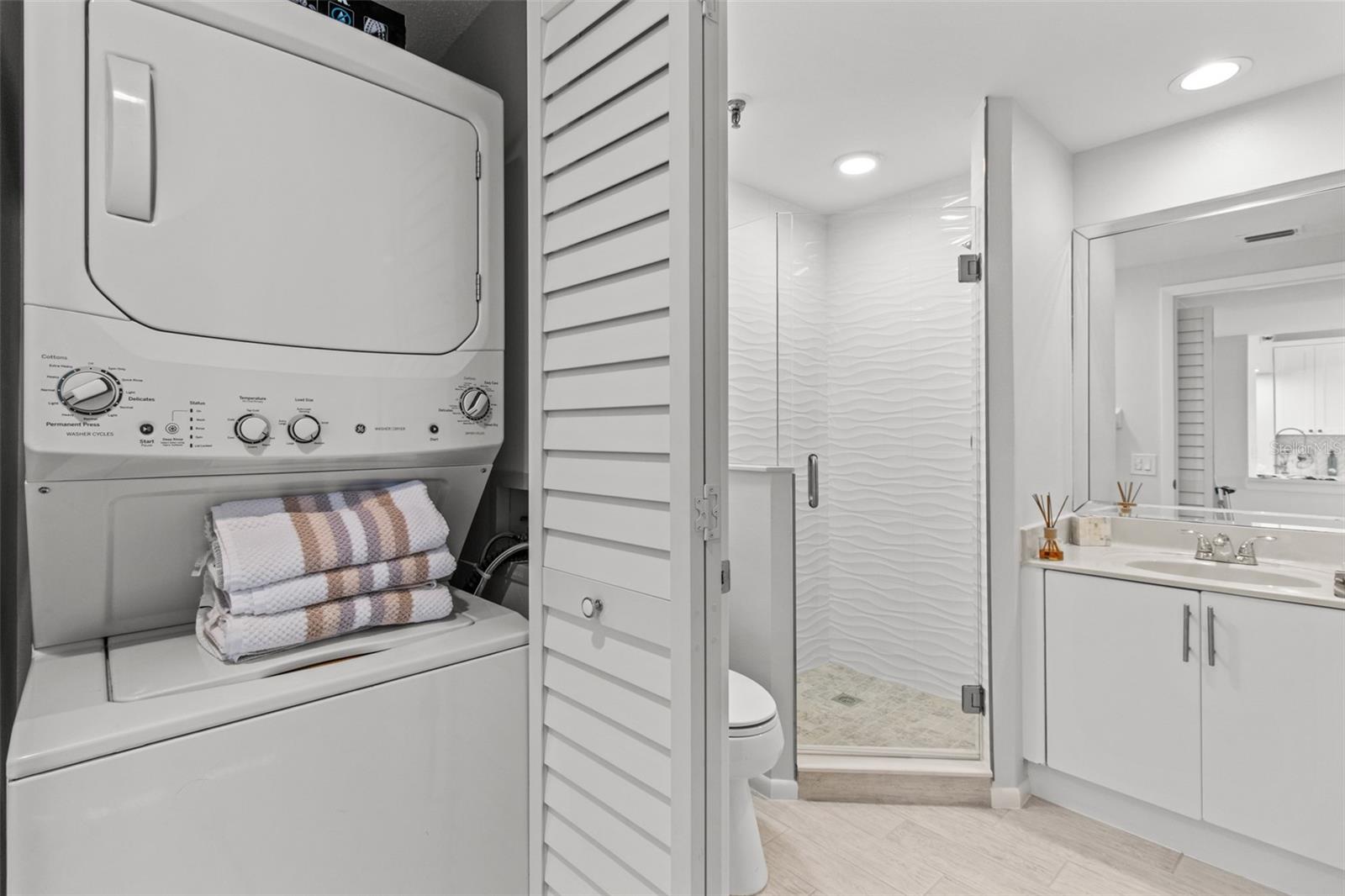 Convenience meets functionality with a full-size washer & dryer tucked neatly into the laundry closet.