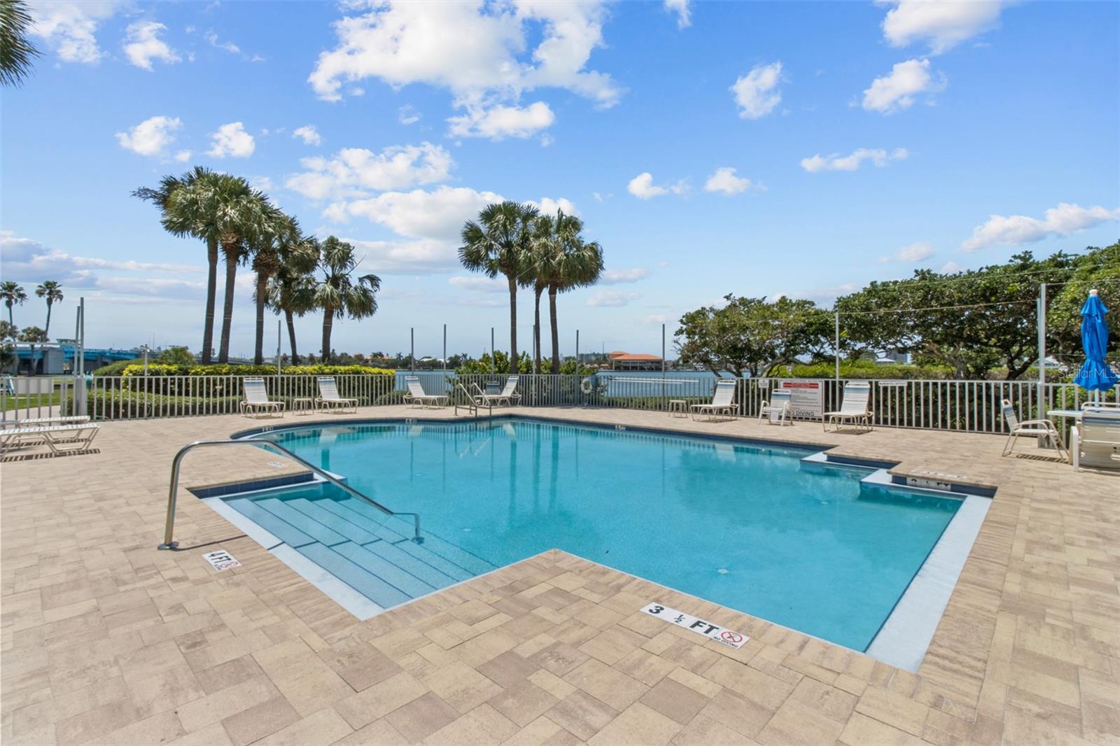 Framed with tropical landscaping and water views.  It's time to make your move to the sunshine state!