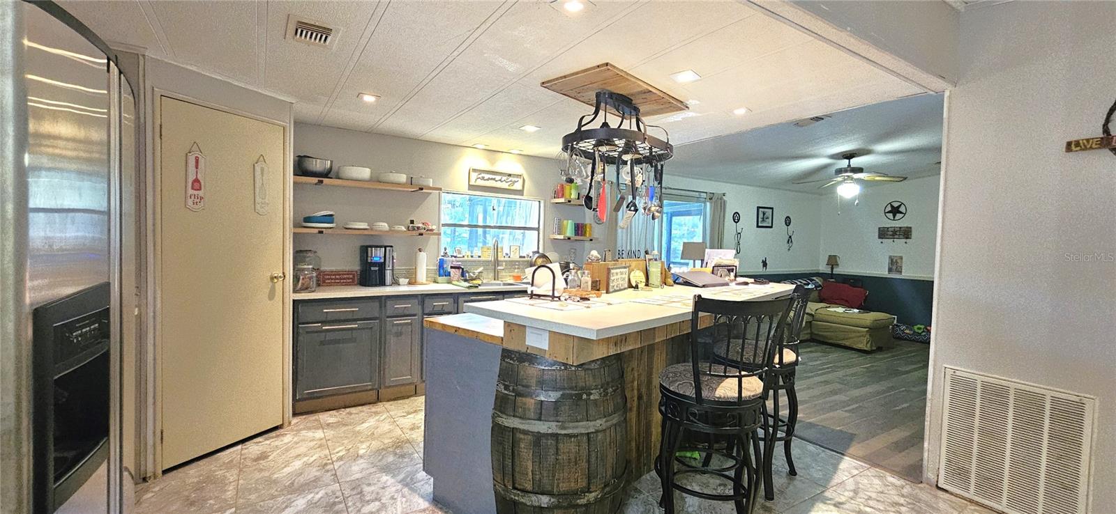 Kitchen includes walk-pantry, propane gas stove