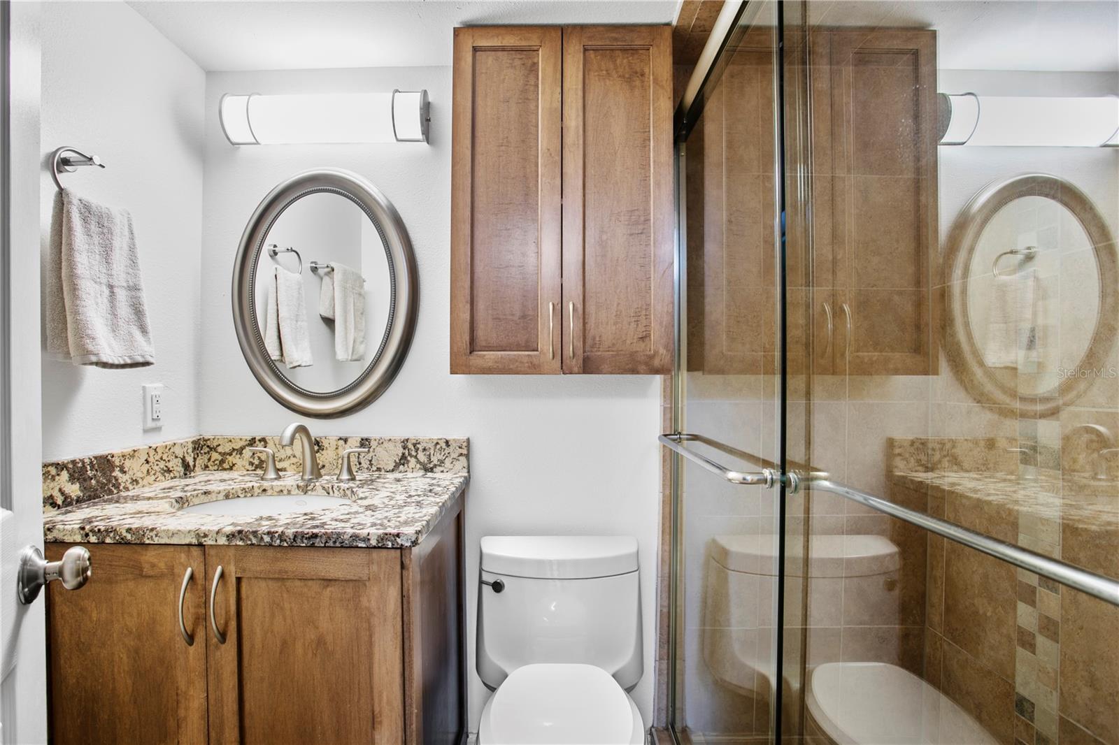 The primary bath enjoys a nice oversized walk-in shower