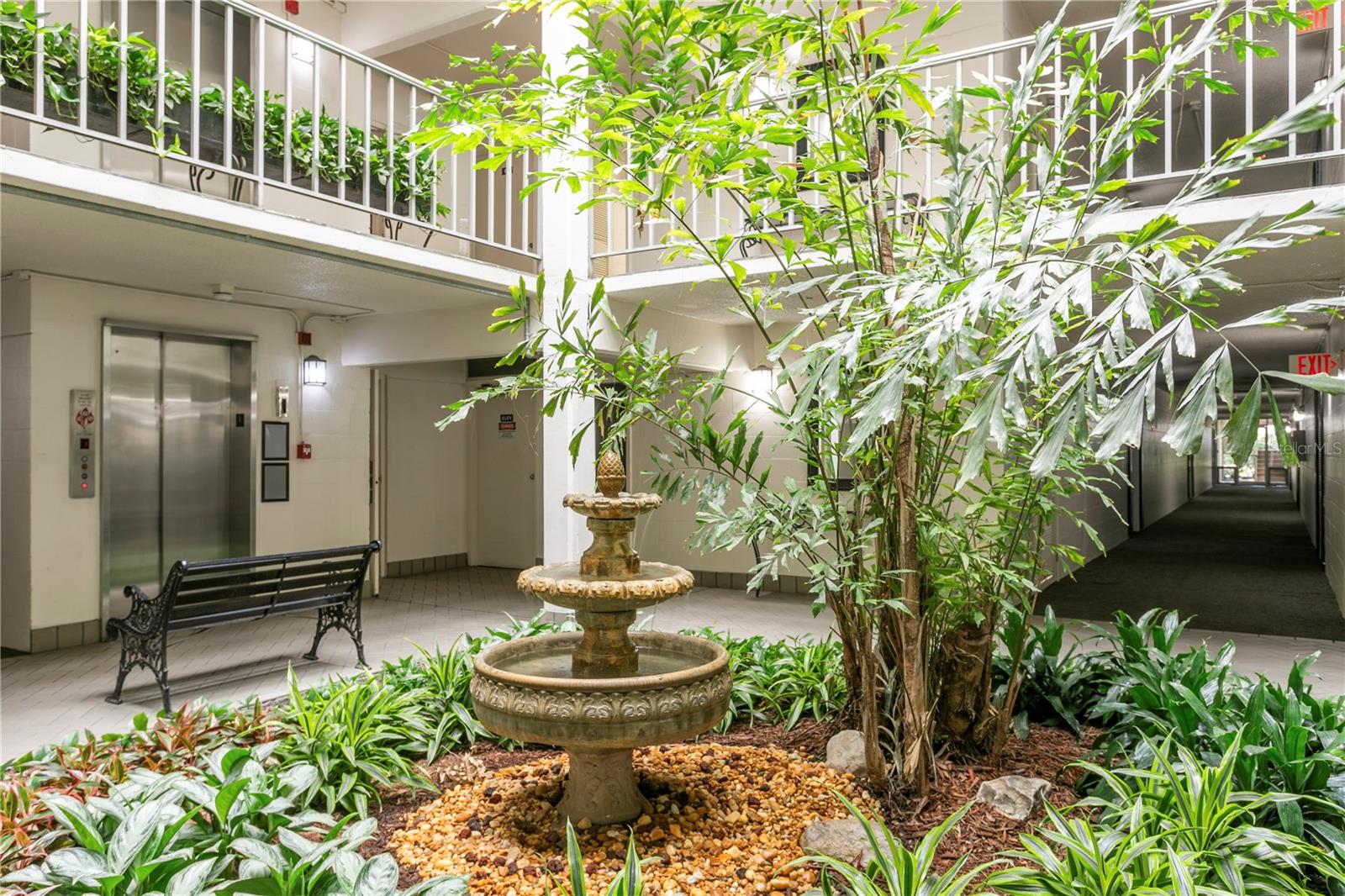 Beautiful interior courtyards make one feel like they are in Italy.