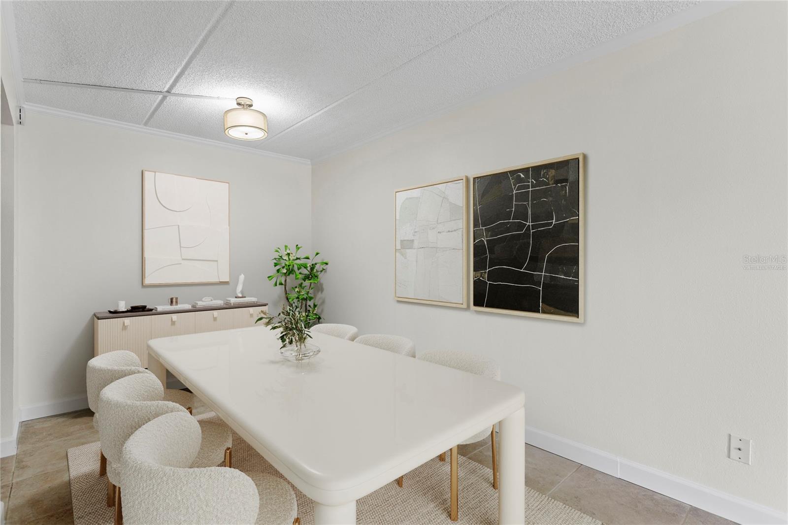 Dining room steps from kitchen and adjacent to living room.  Virtually staged