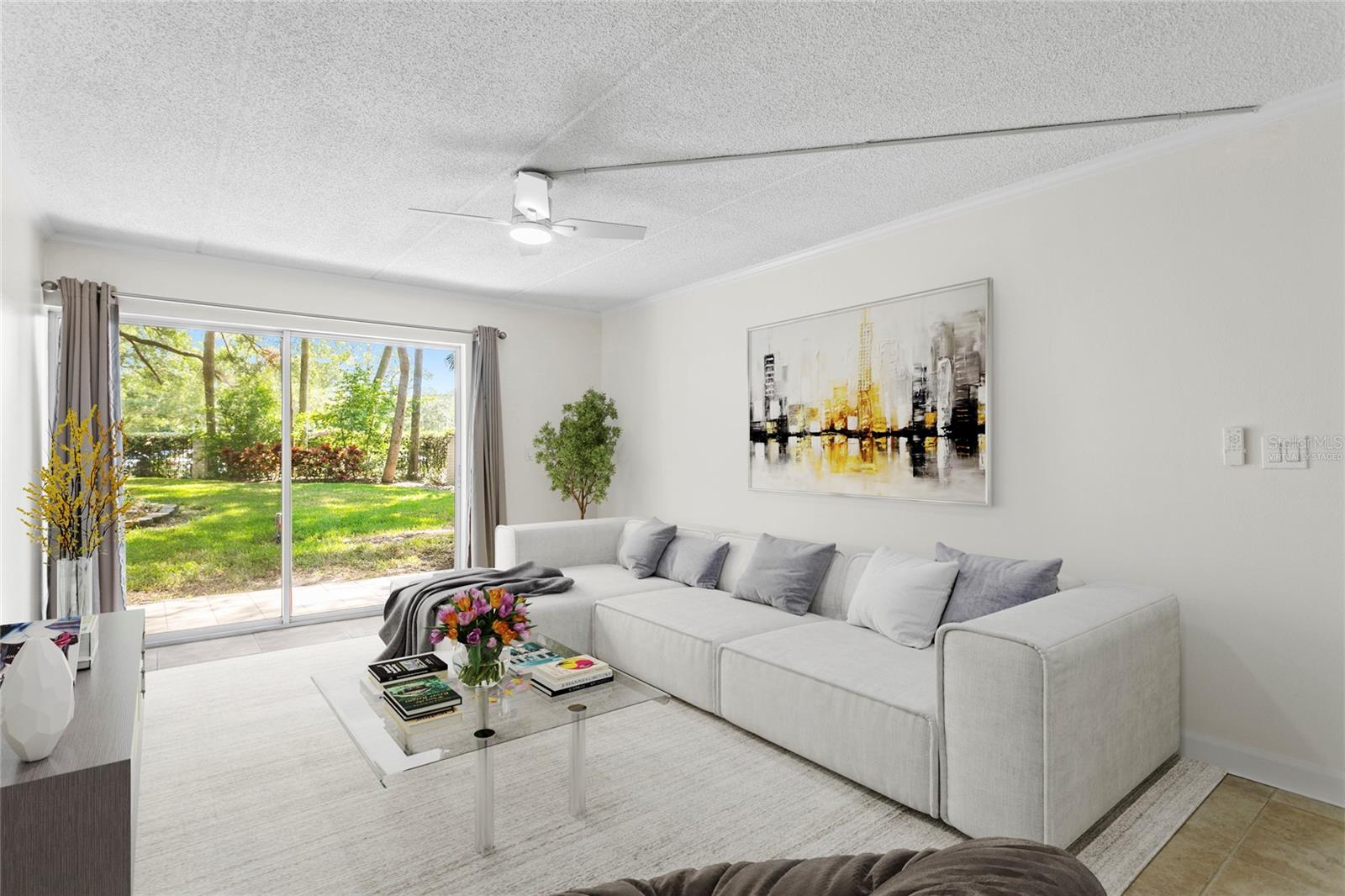 Spacious living room with large sliding door to courtyard.  Virtually Staged