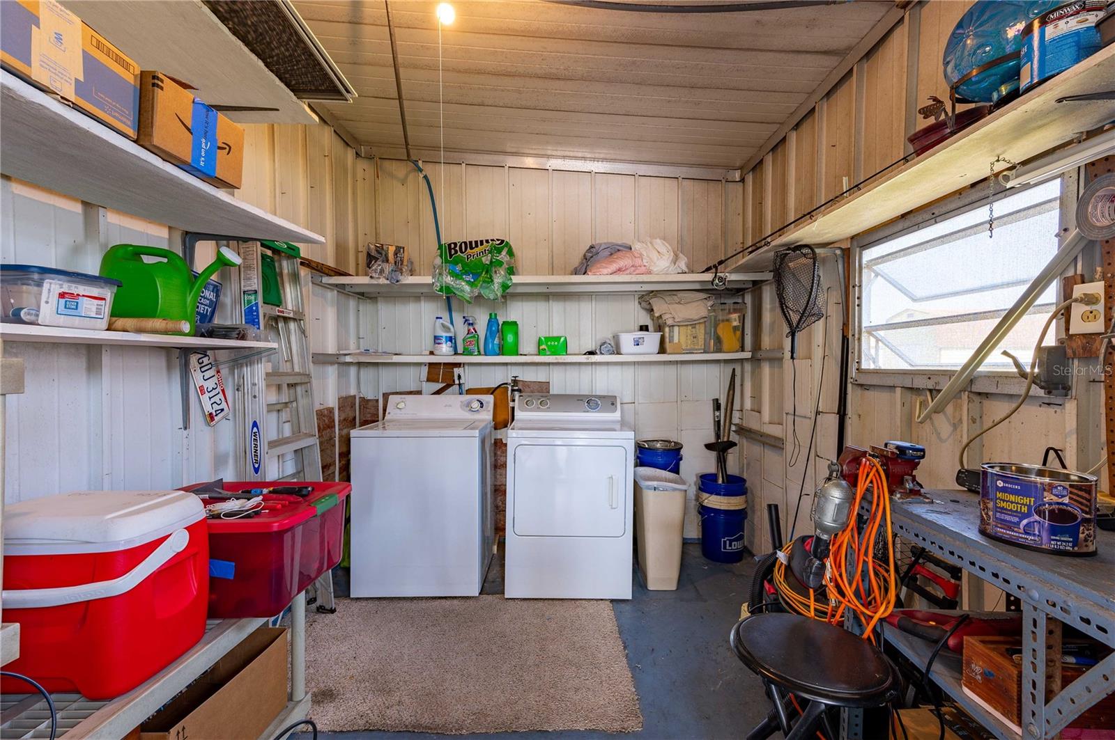 Laundry area is off the carport.