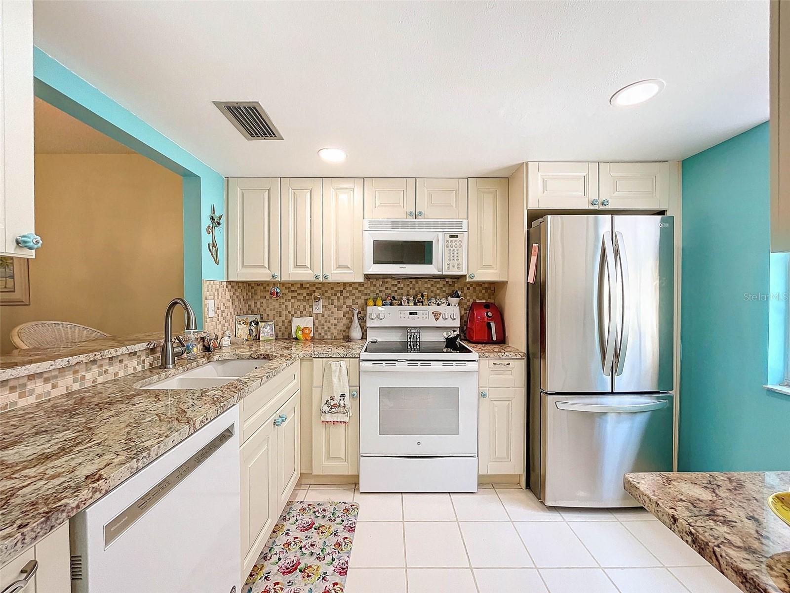 Gorgeous granite countertops & updated cabinets