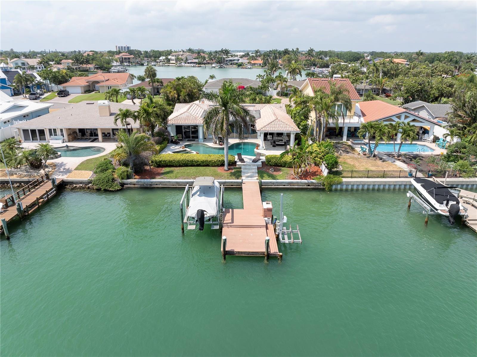 Aerial view of Back of House Pool and Boat Dock