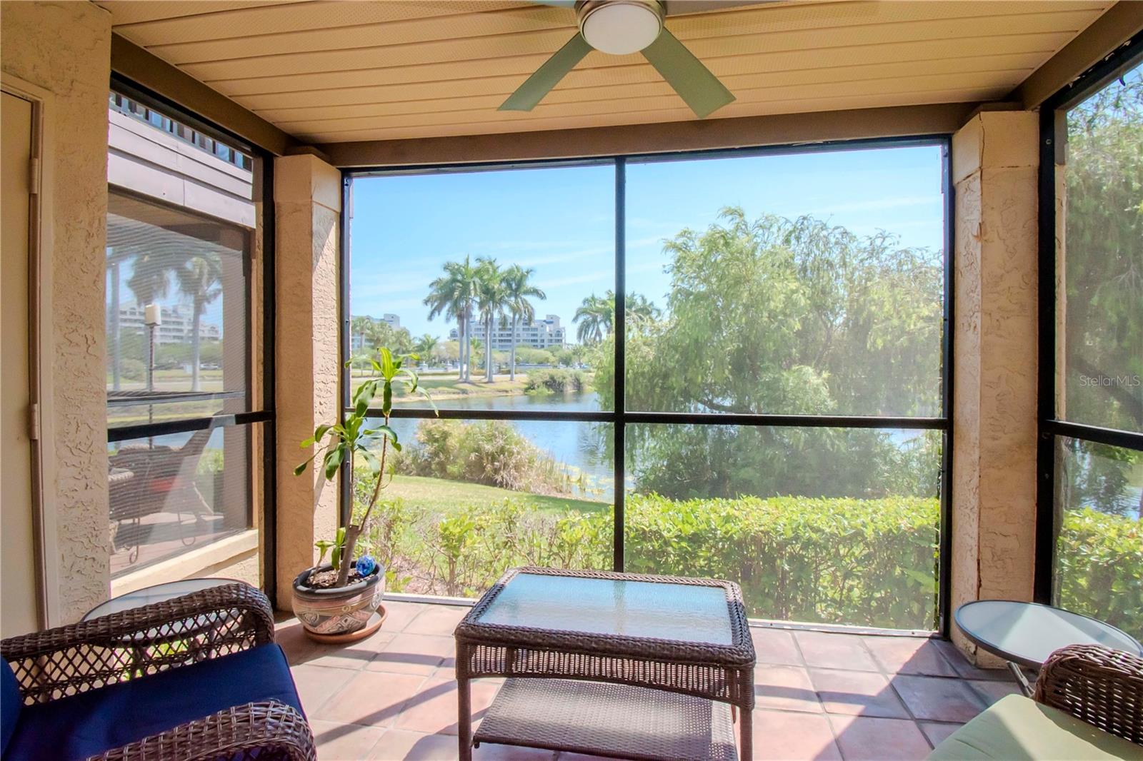 Rear Porch/Patio (screen enclosure and water view)