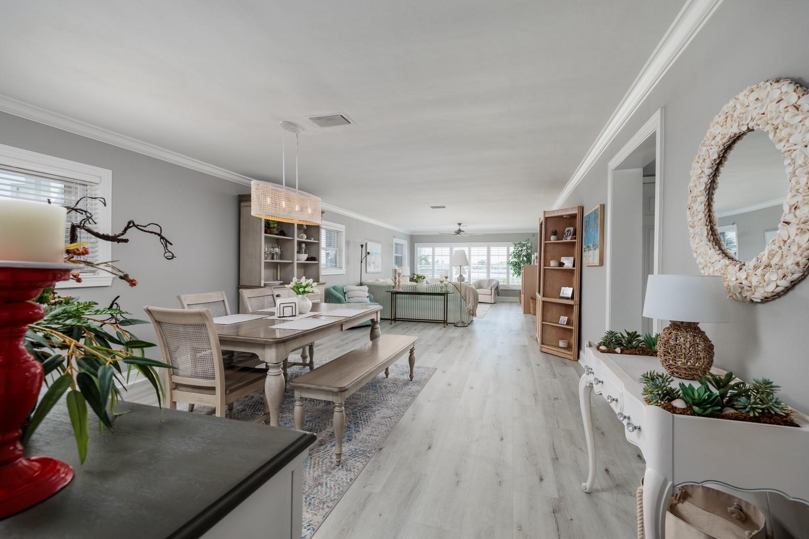 Great Room (15'x41'). Luxury vinyl plank flooring. Crown molding.