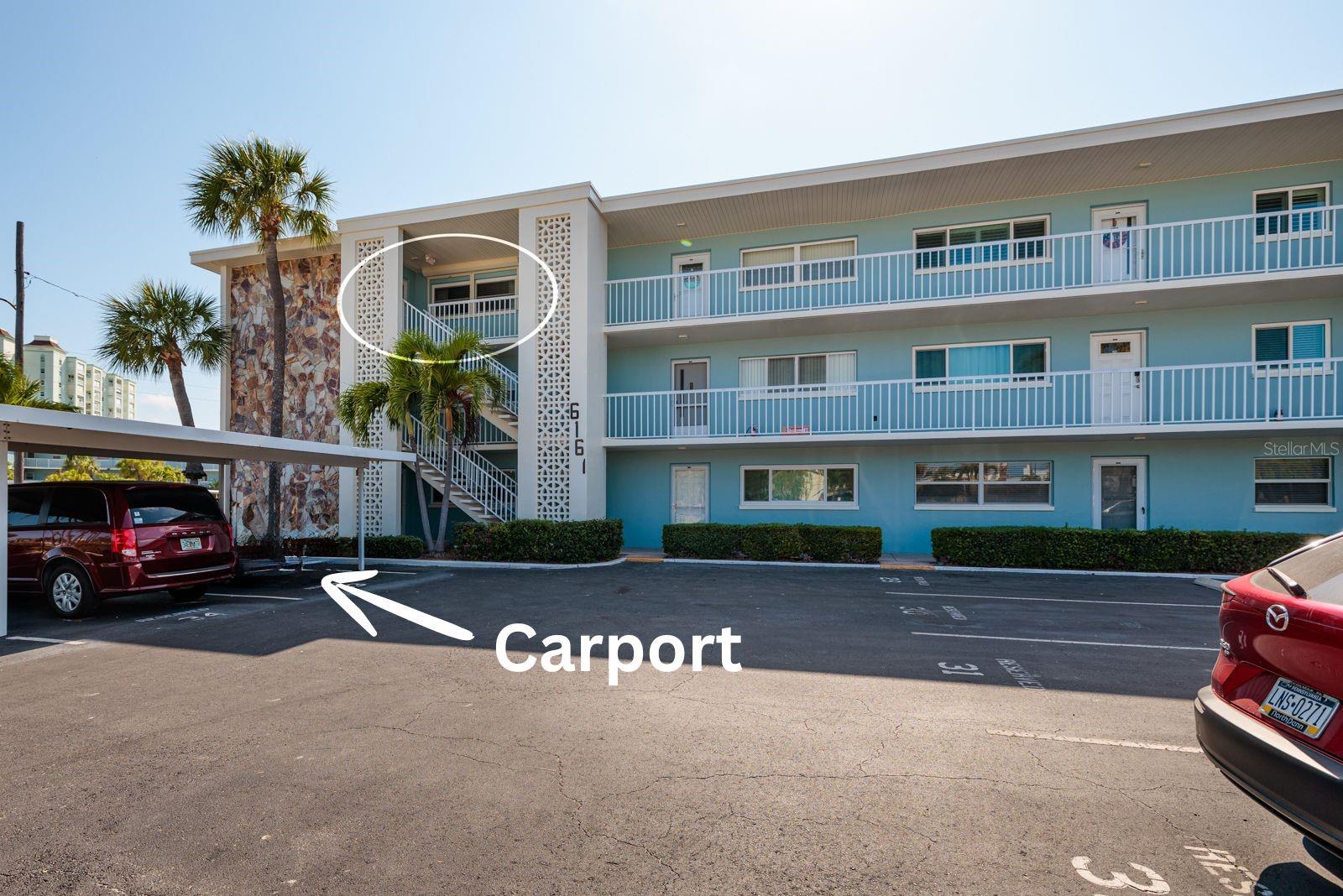 Top floor corner unit & unit carport. Building has an elevator.