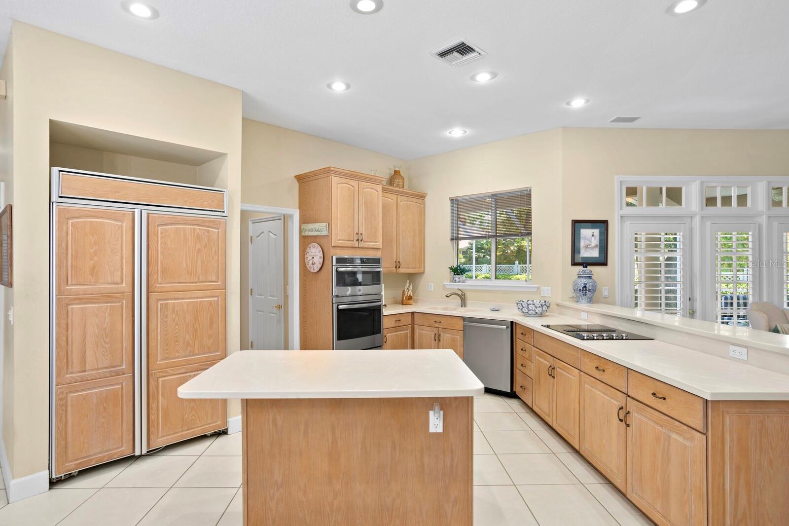 Center Island, Wood Cabinets, Large Walk-In Patry