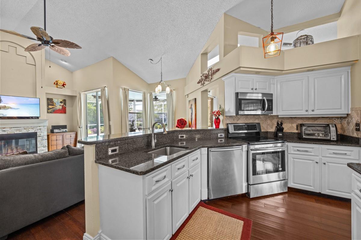 Kitchen, white cabinets and granite coutertops
